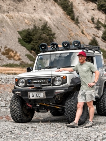 Adam Crouchley with a Suzuki Jimny in the Canterbury high country